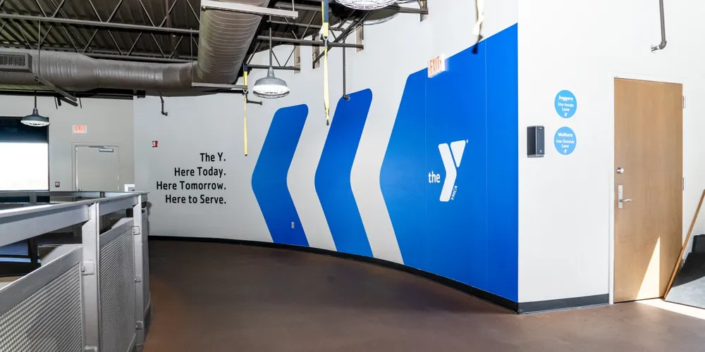 Indoor walking track with blue decals