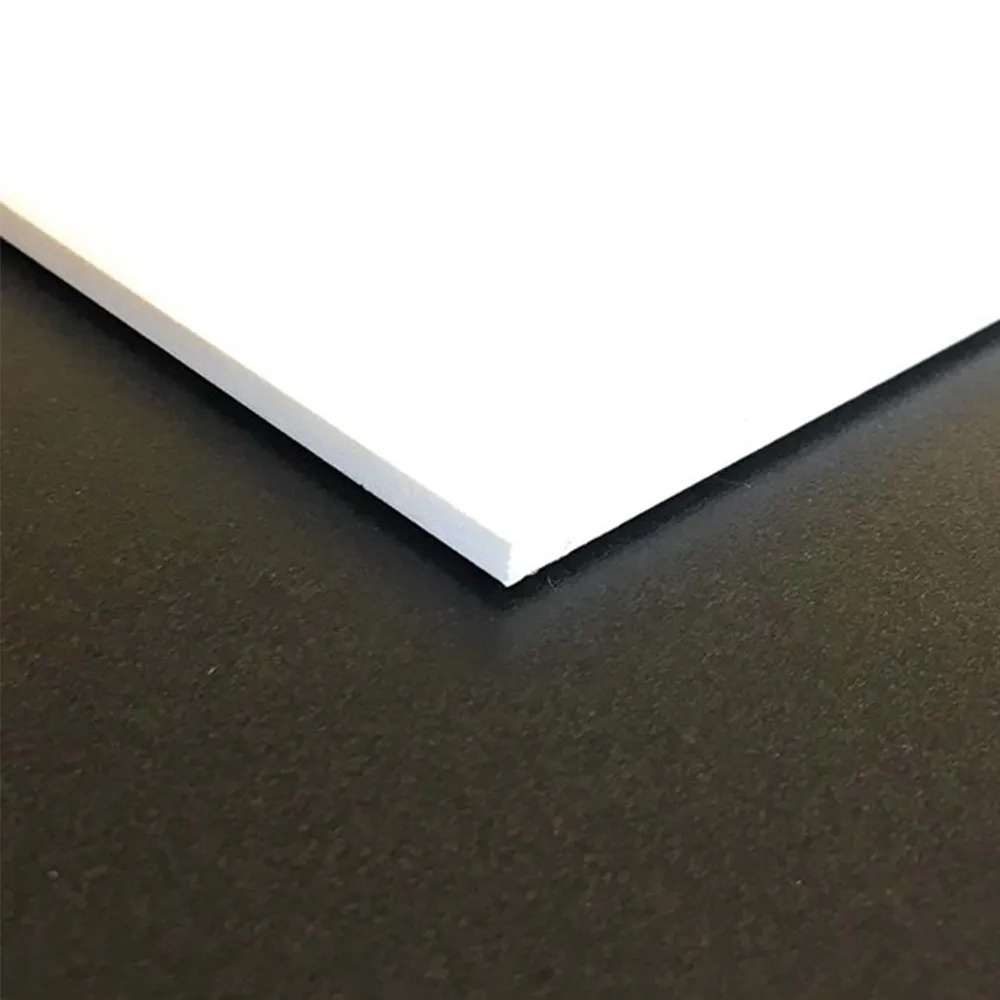White square edge of PVC sheet lying on black background.