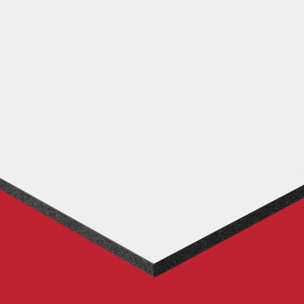 Square edge of Ultra Board sheet on red background.
