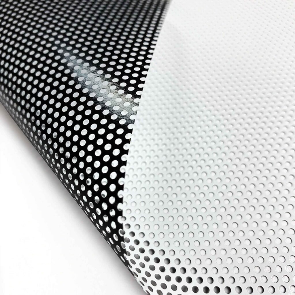 Material example of window perf on white background. Window perf has a white print side and a black adhesive side.